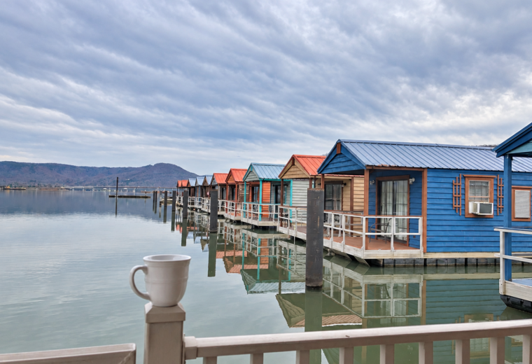 Colorful floating cabins and lake reflections at Hales Bar Marina in Tennessee